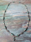 Necklace With Howlite Beads  Flower Charm And Silver Plated Accents