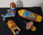 Vintage Lot Of Tin Lithograph Friction Toys  cat seal boat top 