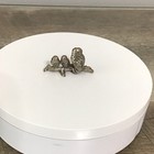 Miniature Owl Figurine Sitting On A Branch