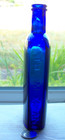 Nice Victorian Blue Bottle Embossed the Mexican Hair Renewer with Uneven Inside 