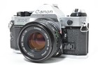  n mint canon Ae-1 Program Slr 35mm Film Camera     Lens Fd 50mm F 1 8  2737736