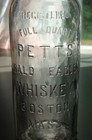 Antique Whittled Petts  Bald Eagle Whiskey- Boston  Mass  12-1 4  Bottle