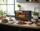 4 Slice Toaster Oven With 3 Settings  Includes Baking Rack And Pan  Black  New