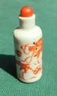 Vintage Chinese Snuff Bottle     Red Dragon Porcelain     3  W  Domed Stopper