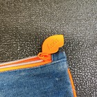 Ipsy Denim Makeup Bag With Orange Trim With Zipper Closure And Orange Lining