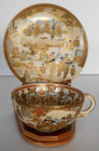 Satsuma Shimazu Earthenware Tea Cup   Saucer   Japan   Figures With Gold Accents