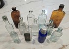 Lot Of 12 Antique Embossed Glass Medicine   Misc  Bottles Vtg