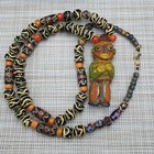 Venetian Inspired Black   Yellow Trade Glass   Old Face Glass Pendant Necklace