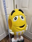 Yellow M m Candy Store Display