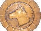  848 Italian Hammered Copper Plate With A Raised Horse Head In The Center