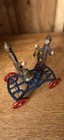Vintage Cast Iron Double Bellman Pull Toy Reproduction - Gong Bell Style