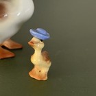 Retired Hagen Renaker Mother Goose In Hat With Flower Heel Boots Babies Set
