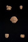 A Framed Group Of Five Pre Columbian Heads Terracotta Fragments