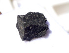  417 Grams Crusted Side 10x5x5mm Murchison Meteorite In A Glass Top Display Case