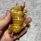 Golden Nanmu Ox Hand Piece Water Wave Grain Carved Decor  random Color 