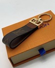 Louis Vuitton Leather Monogram Dauphine Dragonne Key Holder