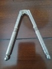 Vintage antique Hmq Stamped Metal Spring Jointed Nutcracker Heavy Metal 5   