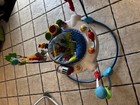 Baby Einstein Neighborhood Symphony Activity Jumper Bugs Birds Multicolor