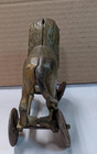 Ac Williams Cast Iron Lion Coin Bank On Wheels 1920s
