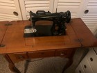 Singer  Sewing Machine With Wood Storage Table