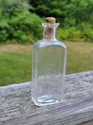 Rare Antique Winchester  gun Oil  Bottle - Clear Embossed Glass