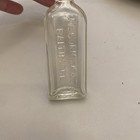Antique Mccormick   Co Baltimore Extract Embossed Glass Bottle Apothecary