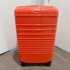 B  is Medium Check-in Roller Luggage- Glossy Flame Orange  Beis