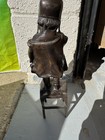 Antique vintage Bronze Sculpture Of A Girl W shoe On Chair