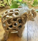 Vintage Soapstone Elephant Baby Inside Hand Carved Ornate Yellow Green Trunk Up