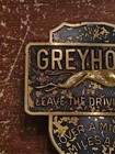 Vintage Greyhound Lines    over A Million Miles A Day    Bus Driver Badge Blue