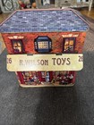 Vtg Metal Tin Toy Shop Canister With Canopy Dept 56   Yellow Tin Christmas House