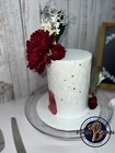 1 Tier Fake Cake Display - 8 Inch Tall  6 Inches Tall Red And White With Flowers