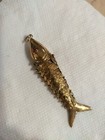 Antique 14k Yellow Gold Articulated Fish Pendant With Red Rhinestone Eyes