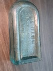 Shiloh s Consumption Cure  Embossed Aqua Bottle  S  C  Wells   Co  Leroy  N y 