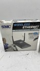 Smc Smc2870w Wireless Ethernet Bridge   Netgear A6210 Ac1200 Lot Of 2