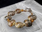 Artisan Lampwork Glass Bracelet Swirl Beads Earth Tone Handmade 8   