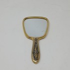 Vintage Handheld Vanity Metal Mirror Gold Tone Handle Ornate Patterned Back