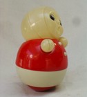 Vintage Celluloid Rolly Polly Squeaker Doll Toy 