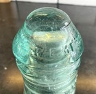 Vintage  W e mfg  Co  Aqua green Glass Insulator  Embosed W u    J  Patent 1871