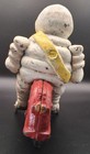 Cast Iron Michelin Man  bibendum  On A Motorcycle 8 1 2 Inches Long