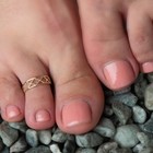 Yellow Gold Woman s Trendsetting X Toe Ring