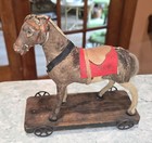 Antique German Paper Mache Pull Toy Horse On Wood Platform With Cast Iron Wheels