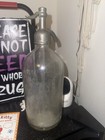Dola Bottling Co  Clear Seltzer Bottle Metal Siphon Top Etched Glass