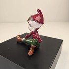 Vintage Maroon Red Ceramic Pixie Elf Figure Sitting Legs Open Mischief