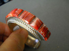 A Norton Native American Spiny Oyster Raised Inlay Row Sterling Silver Bracelet
