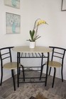 3-piece Dining Set Oval Table   2 Chairs  Black Metal Frame  Beige Top