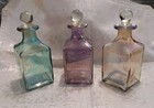 Set Of Irridescent Decorative Glass Bottles