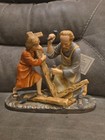 The Carpenter Figurine Representing Joseph Teaching A Young Jesus