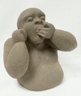 Hand Carved Stone Sculpture Of Eating Man