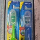 2 Oral-b Shiny Clean Toothbrushes W  Travel Caps Soft 35 Z Shaped Bristles  2009